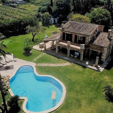 Ciclismo y golf junto a la playa Finca Son Sant Martí Gran Vila Muro Exterior foto